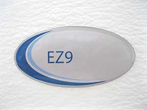 Booth Medical - Label, Door Blue Oval - Tuttnauer EZ9 Autoclave Part: LAB048-0285