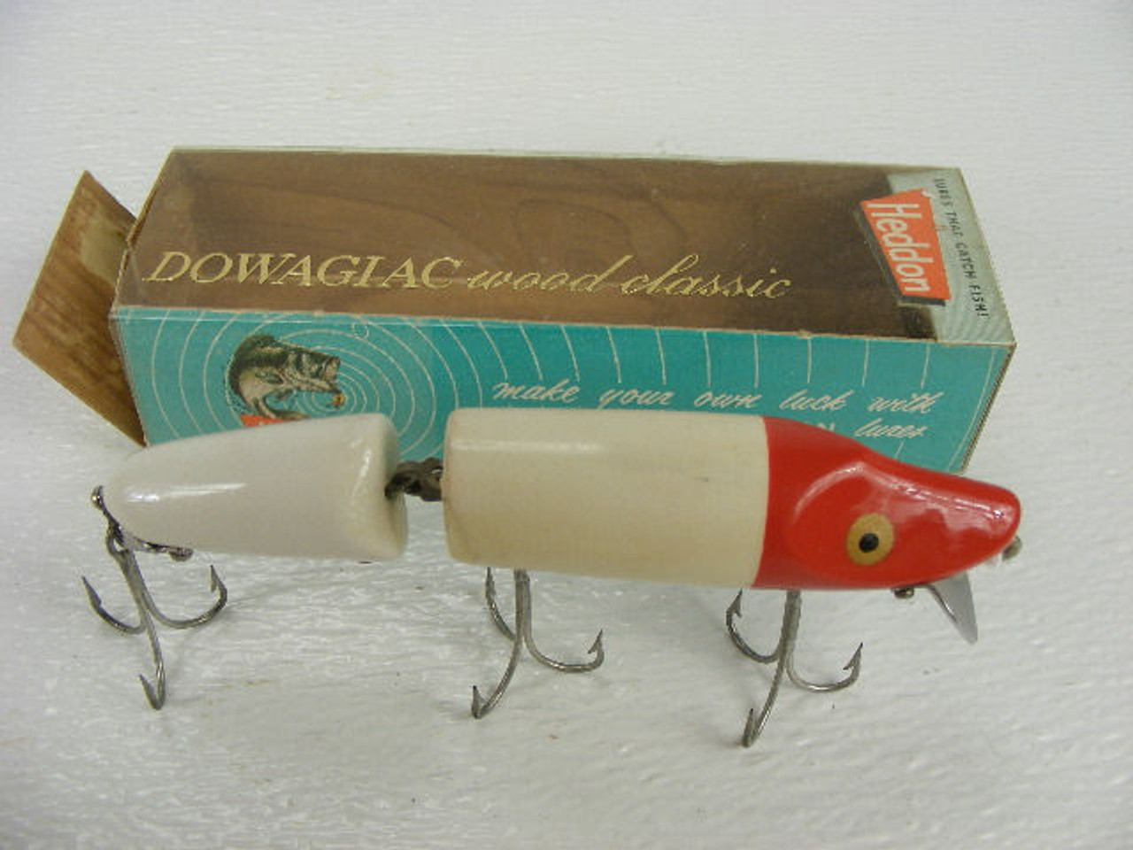 A 5 vintage Heddon Dowagiac Jointed Vamp wood lure #7300RH with the  original box from the 1960s.