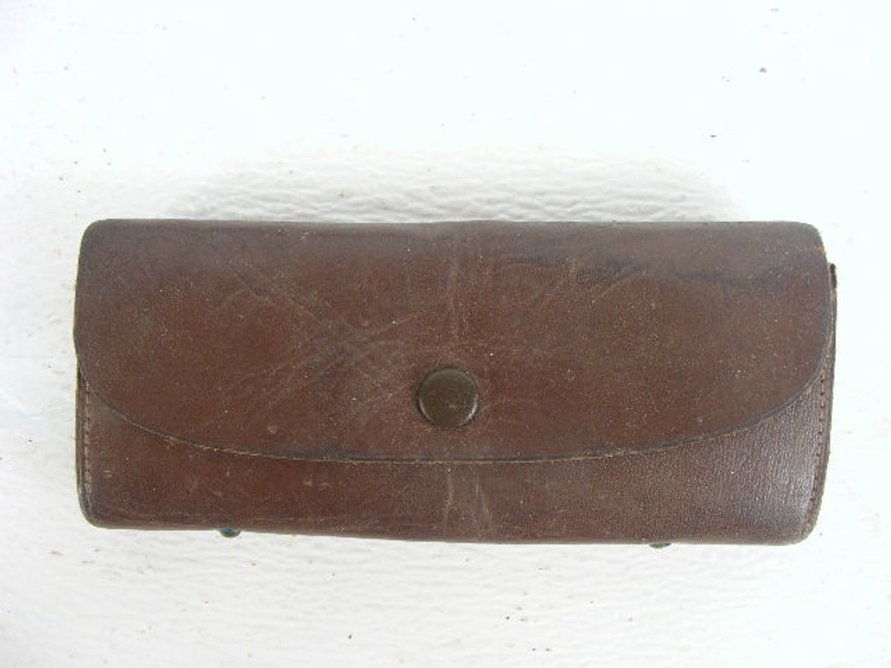 An old fishing hook holder leather pouch. - Antique Mystique
