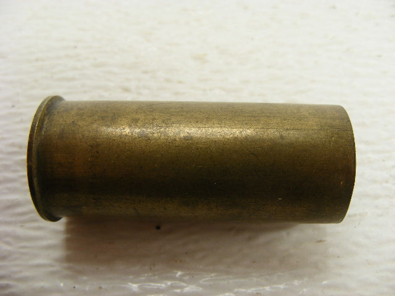 This shorter old brass 12 gauge shotgun shell casing is from Italy. -  Antique Mystique