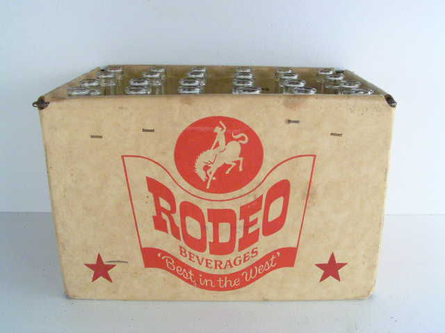This vintage Rodeo soda pop bottle case made by Rodeo Beverage Co. of