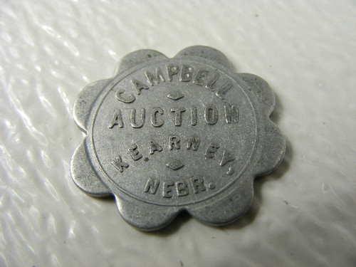 A vintage Kearney,Nebraska trade token from Campbell Auction good for 5 cents in trade.