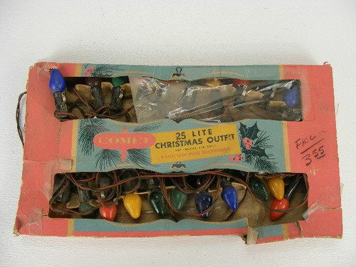 A string of vintage Comet Christmas tree lights in the original box that light up.