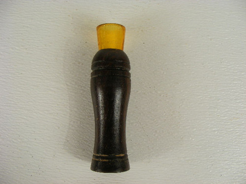 A vintage Herter's game call.