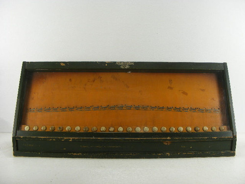 This is an old Remington knife display case cabinet with original green paint finish.It does show some wear with no key and it measures 29&quot; wide x 12&quot; high x 10 1/2&quot; deep.