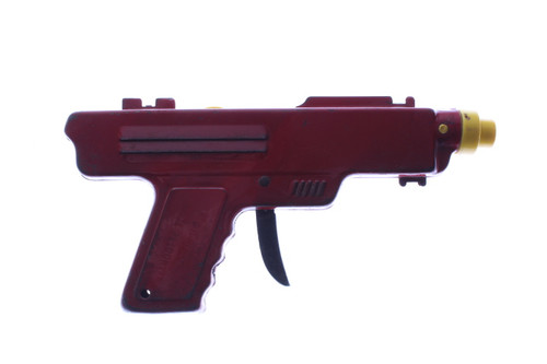 An old metal toy squirt gun marked Wyandotte Repeater.