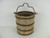 A really neat antique wooden well water bucket with hand forged metal for drawing water out of a well by rope that measures 13" high.