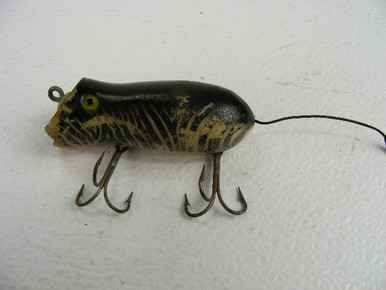 A vintage Shakespeare Glo-Lite Swimming Mouse fishing lure with finish wear  that measures 2 3/4" long. - Antique Mystique
