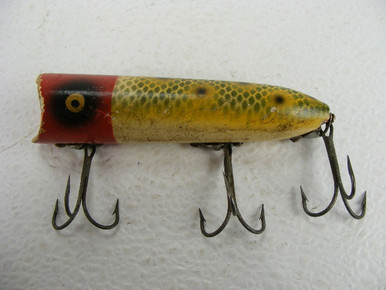 This is a 4" antique Heddon Lucky 13 wooden fish lure from the 1930s  with wear.