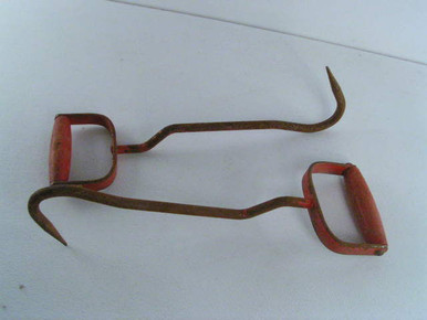 These 15" long vintage hay hooks have red paint wooden handles. -  Antique Mystique