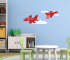 Airplanes Clouds Boys Wall Art Vinyl Decals Room Decor Stickers — Colorful red airplanes and clouds on a soft blue wall,