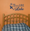 All You Need Is Love and the Lake Camper Decor Wall Lettering Decals — Navy blue wall decal above a wooden bed frame against