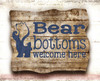 Bear Bottoms Welcome Here Vinyl Lettering Wall Art Decals Stickers Bathroom Camper — Rustic wooden sign with bear silhouette