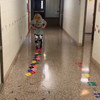 Sensory Path Floor Decals School Hallway Hopscotch Alphabet Letter Diamond — Colorful floor tiles in a hallway, child