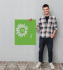 Sunflower Numbers Playground Stencil Outdoor Sensory Path — Man holding a green poster with a white sunflower design against