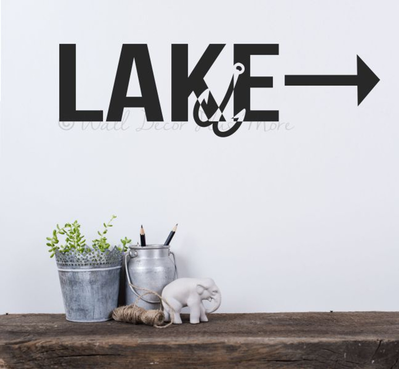 https://cdn11.bigcommerce.com/s-571px4/images/stencil/1280x1280/products/2678/18912/WD1336_Fishing_Decor_Beach_Wall_Decals_Lake_Arrow_Fish_Hook_Vinyl_Letter_Stickers_23x7-Inch_Black__35202.1643234026.jpg?c=2