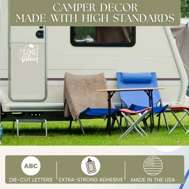 Gone Fishing Car Truck Window Decals Fisherman Vinyl Stickers — White camper trailer parked on grass with blue chairs and a