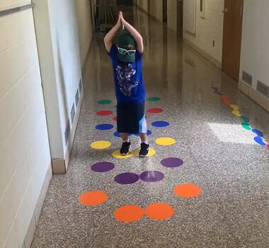 Sensory Path 8-Inch Polka Dot Stickers Vinyl Decals School Hallway Hop — Colorful circular shapes arranged on a school