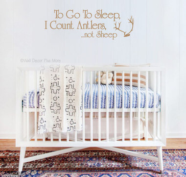 Count Antlers to go to Sleep Wall Sticker Decals Vinyl Wall Letters for Kids Room — White crib against a wooden wall, with