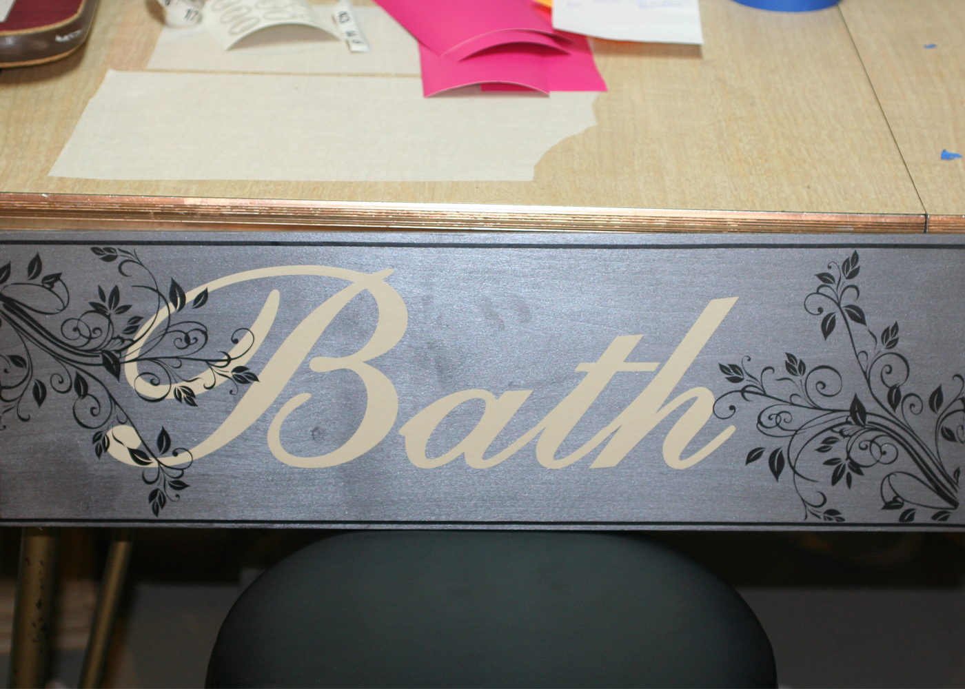 bath-vinyl-decal-lettering-with-scrolls-on-board.jpg