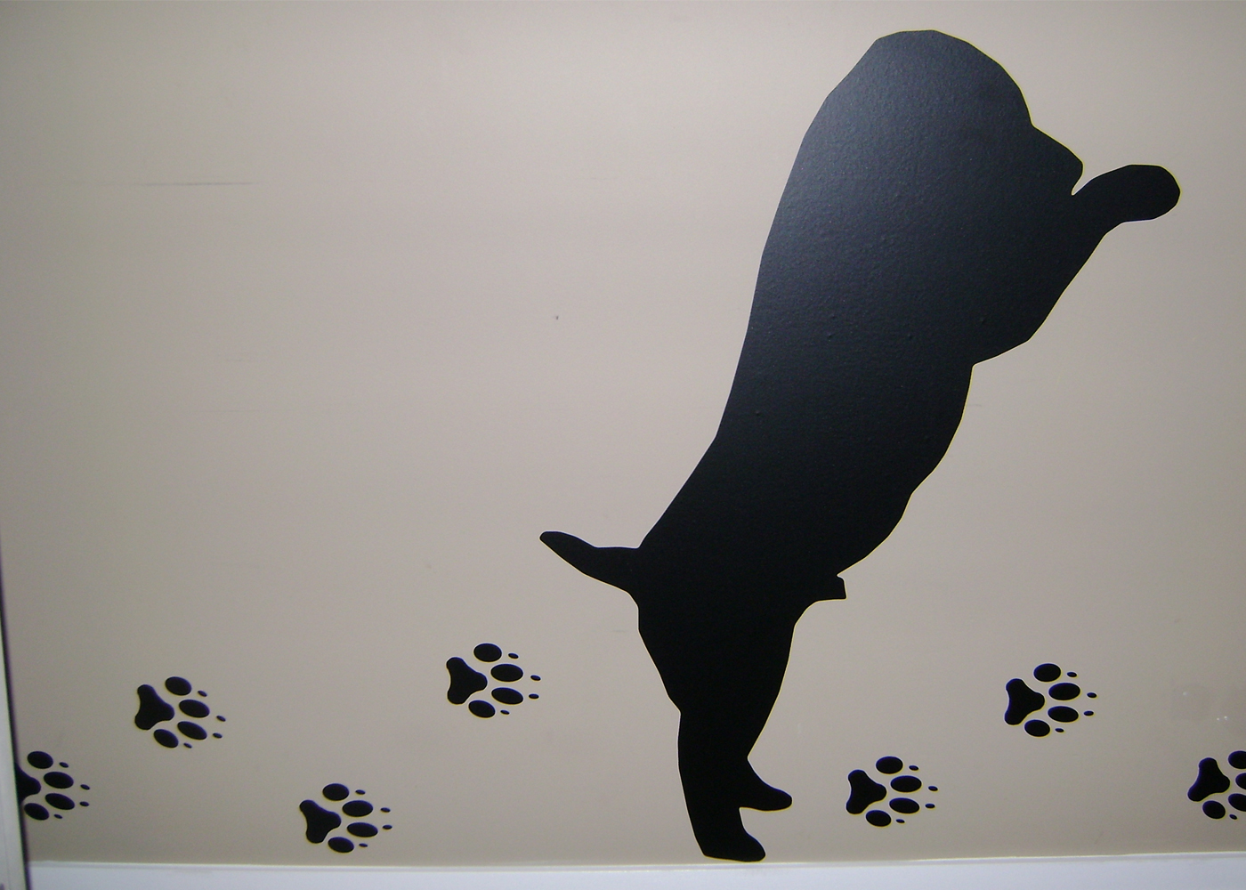 dog-vinyl-wall-decal-stickers-on-wall-with-paws.jpg