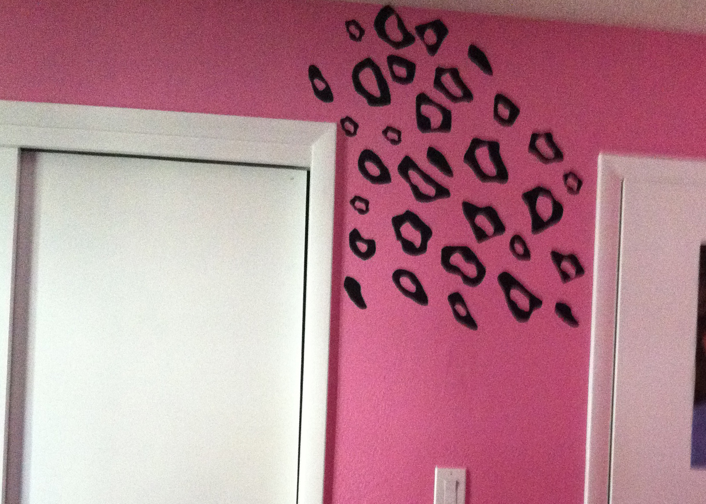 leopard-vinyl-decals-black-on-pink-wall.jpg