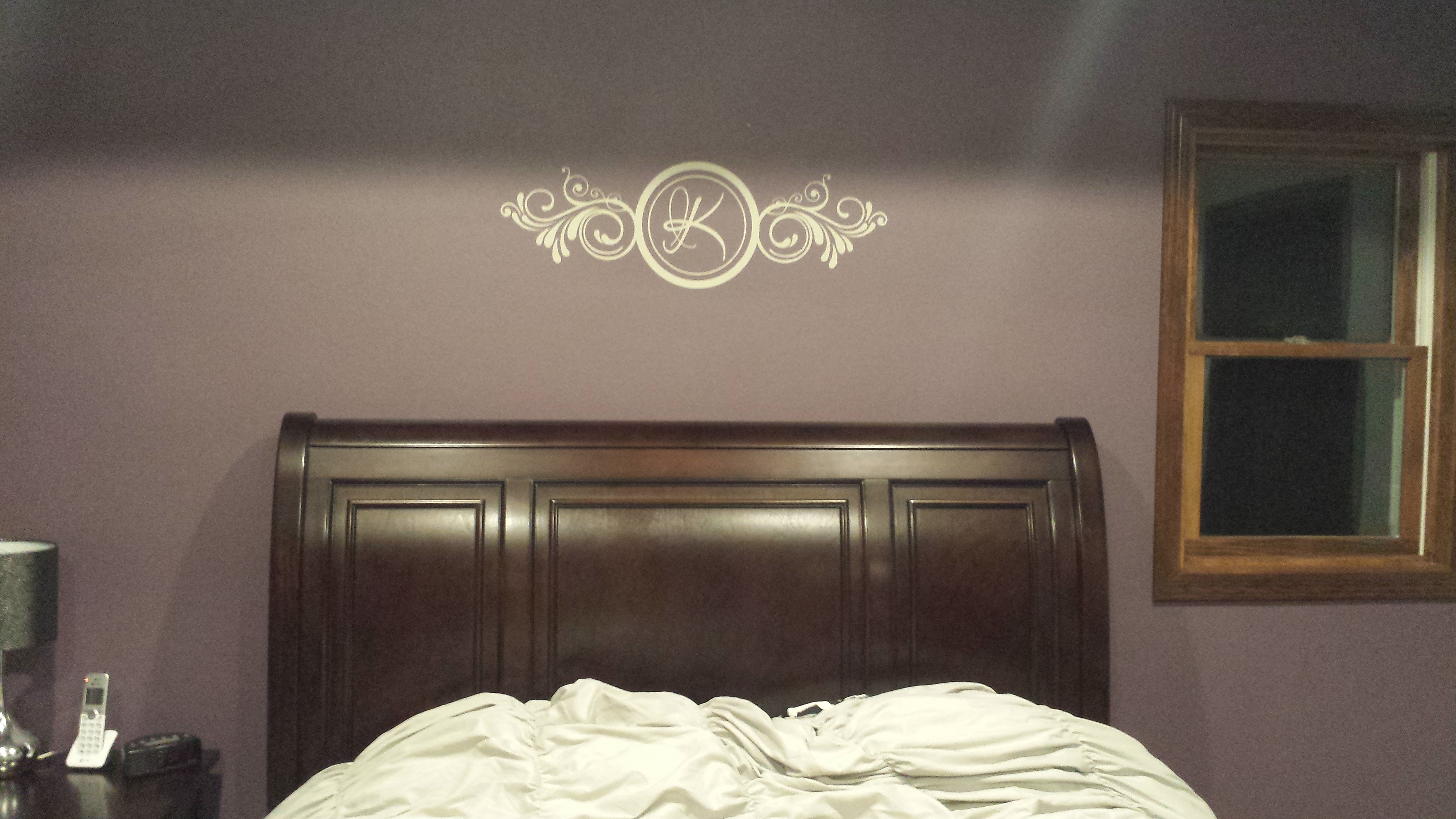 monogram-last-name-above-headboard-master-bedroom-decal.jpg