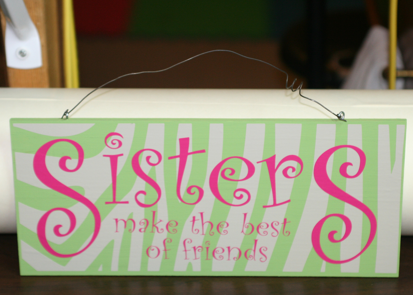 sisters-vinyl-decal-quote-on-board.jpg