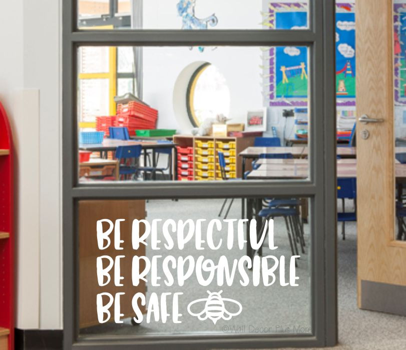 Be Respectful Responsible Safe bee decal above classroom cubbies and shelving