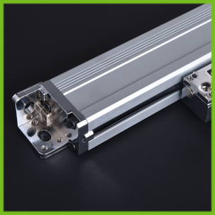 Where are glass scale linear encoders used?