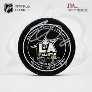 Front view of the Nathan MacKinnon autographed 2017 NHL All-Star Game puck featuring his silver signature, “1st ASG” inscription and LA All-Star logo.