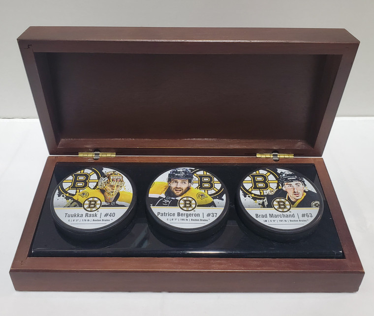 Boston Bruins Player Puck Collection in Mahogany Display