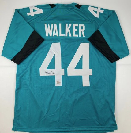Autographed/Signed Travon Walker Jacksonville Teal Football Jersey Beckett COA