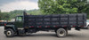 FORD L7000 Single Axle Dump 22' Rack Body, Cummins 12V-5.9 230hp, Equipped w/Side Tool Box, Runs Great - Real Clean   FORD L7000 Single Axle Dump 22' Rack Body, Cummins 12V-5.9 230hp, Equipped w/Side Tool Box, Runs Great - Real Clean
