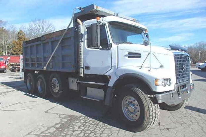 SOLD - Volvo VHD84F200 Steerable Tri Axle Dump Truck