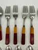 1930s Dual-Toned Mismatched Butterscotch, Cherry Red & Green Bakelite, Lucite & Stainless Steel Flatware Set- 34 Pieces 1930s Dual-Toned Mismatched Butterscotch, Cherry Red & Green Bakelite, Lucite & Stainless Steel Flatware Set- 34 Pieces