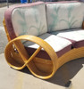 Restored Rattan Six Strand Full Pretzel Curved Settee, in the Style of Paul Frankl Restored Rattan Six Strand Full Pretzel Curved Settee, in the Style of Paul Frankl