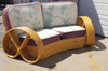 Restored Rattan Six Strand Full Pretzel Curved Settee, in the Style of Paul Frankl Restored Rattan Six Strand Full Pretzel Curved Settee, in the Style of Paul Frankl