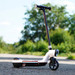 Whizza Prizm Kids 12V Electric Scooter with Flashlights and Headlight (White) 