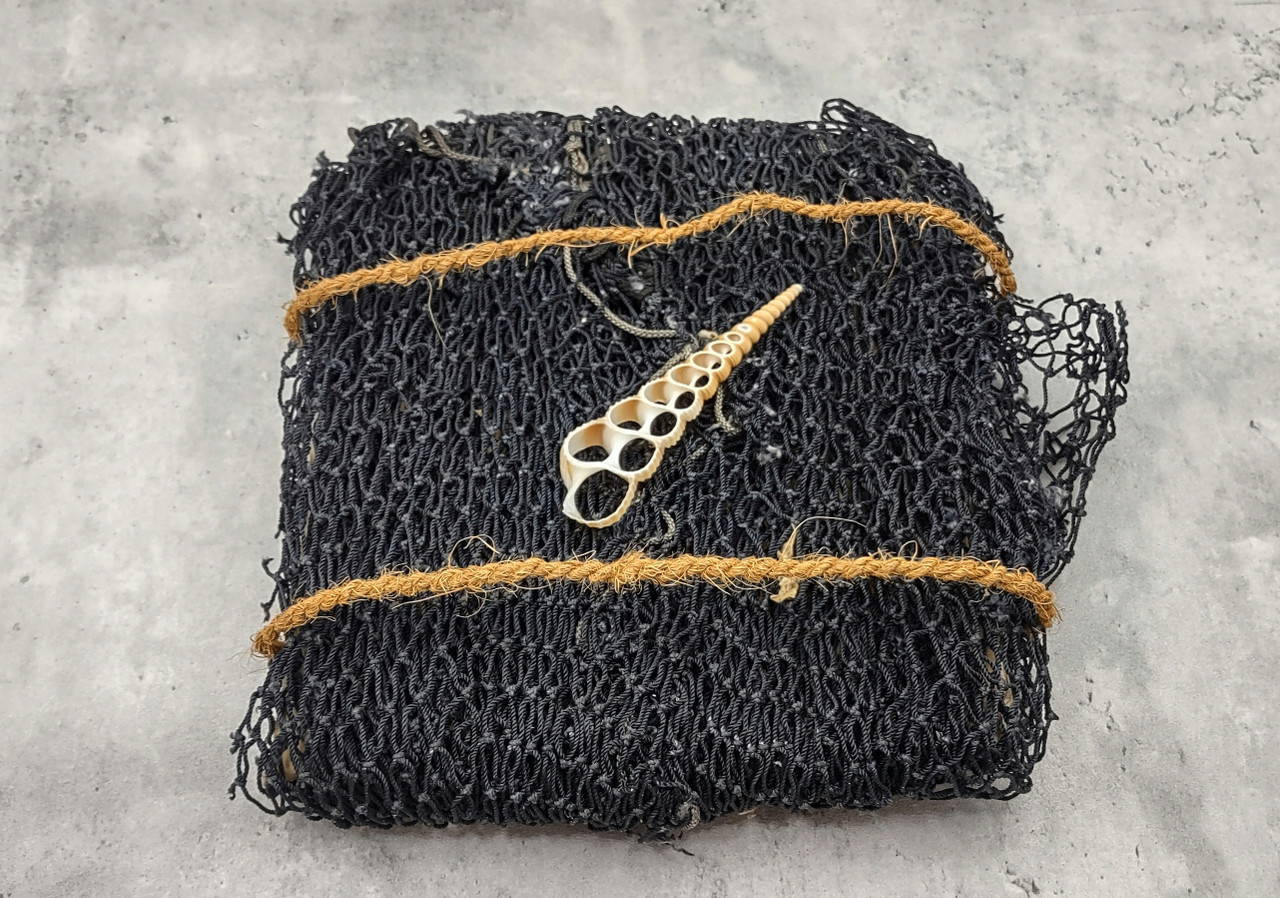 black rope fish netting Decorative Fish Net Black Nylon Tied (1 net approx. 4x9 feet) Recycled  Fishing net for ocean art projects crafts & nautical themed parties!