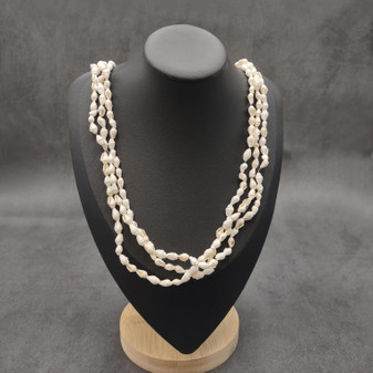 White Nassa Shell Necklace Leis (3 leis approx. 0.20+ inch x 34 inch CIRCUMFERENCE) Beautiful seashell necklace for beach outfits or a gift! Copyright 2026 SeaShellSupply.com.