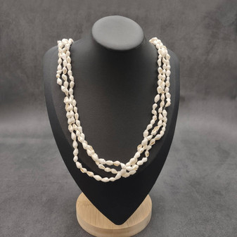 White Nassa Shell Necklace Leis (3 leis approx. 0.20+ inch x 34 inch CIRCUMFERENCE) Beautiful seashell necklace for beach outfits or a gift! Copyright 2026 SeaShellSupply.com.