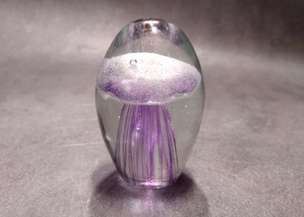 Jellyfish Glass Egg Purple Paperweight Glows (1 figurine approx. 3.5 in tall). Copyright 2025 SeaShellSupply.com.