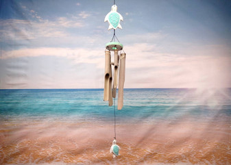Hanging Wooden Green Turtle Bamboo Wind Chime (1 Chime approx. 33 x 4 inches) Turtle Bamboo Windchime brings beachside charm to any home! Copyright 2025 SeaShellSupply.com.
