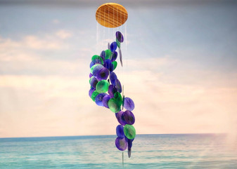 Purple Green Spiral Capiz Shell WInd Chime (1 Chime approx. 23 x 5 inches) Green Purple Capiz Wind Chime brings beachside charm to any home! Copyright 2025 SeaShellSupply.com.