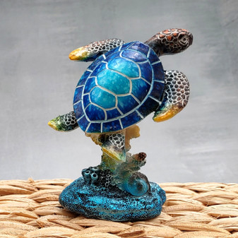 Blue Sea Turtle Figurine Painted Resin (1 figure approx. 3.5+ inches tall) Ocean Blue Sea Turtle for coastal home decor gifts & collecting! Copyright 2025 SeaShellSupply.com.
