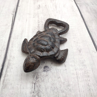 Brown Metal Sea Turtle Bottle Opener (1 opener approx. 4.5+ inches) Cast Iron Patina Sea Turtle Bottle Opener for coastal kitchen or home! Copyright 2025 SeaShellSupply.com.