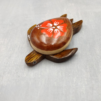 Wooden Sea Turtle Magnet Orange Hibiscus Flower (1 magnet approx. 2+ inches) Wood Sea Turtle Magnet gift for fridges cabinets doors! Copyright 2025 SeaShellSupply.com.