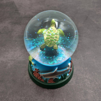 Green Sea Turtle Seasonal Holiday Water Globe (1 globe approx. 4+ inches tall) Charming Brown Sea Turtle Wave Globe for coastal display! Copyright 2025 SeaShellSupply.com.