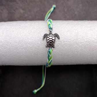 Sea Turtle Bracelet Braided Cord Teal Lime Green White (approx. 5-7+ inches AROUND) Aqua Green White String Sea Turtle Bracelet to gift! Copyright 2025 SeaShellSupply.com.
